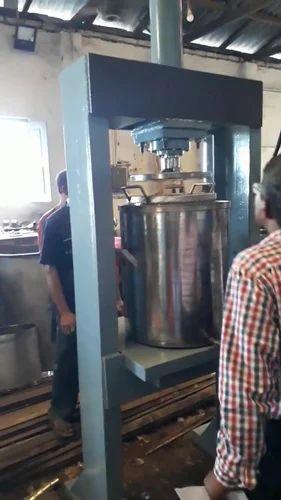 स्वचालित मदर टिंचर प्रेस