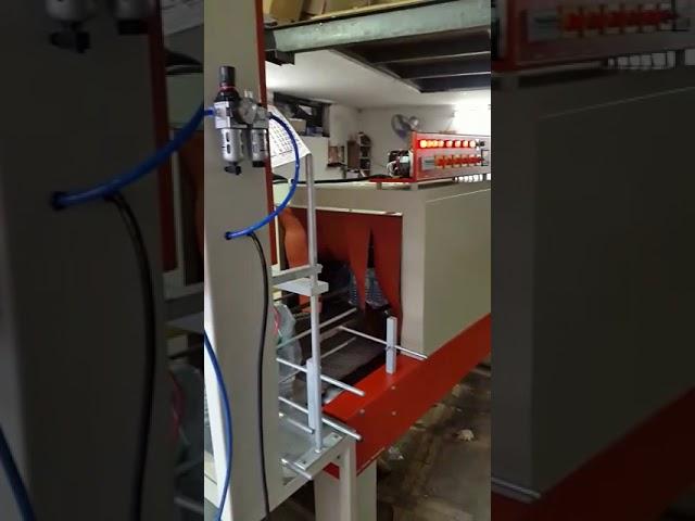Semi Automatic Shrink Wrapping Machine.