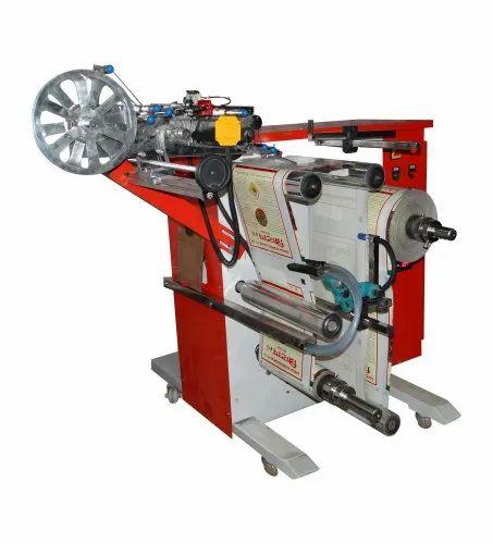 Side Loading Rewinder With Hologram Applicator