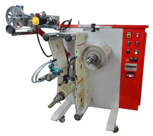 Side Loading Rewinder With Hologram Applicator