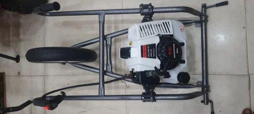 Trolly earth auger